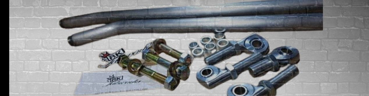 BKFabworks 4th Gen Dodge Ram 2500 3500 4WD Heavy-Duty Steering Upgrade Kit with tie rods, heims, hardware, and BK Fabworks branding over brick background