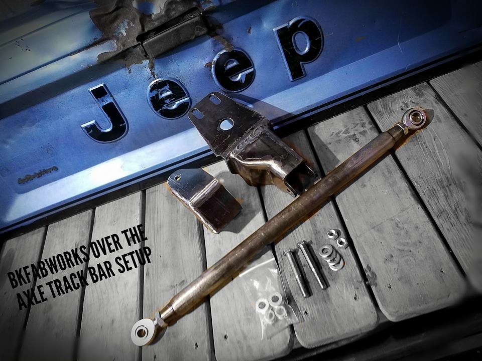 BKFabworks over-the-axle track bar setup for Jeep Cherokee XJ, Comanche MJ, Grand Cherokee ZJ, and Wrangler TJ. Includes bracketry, DOM bar, and hardware