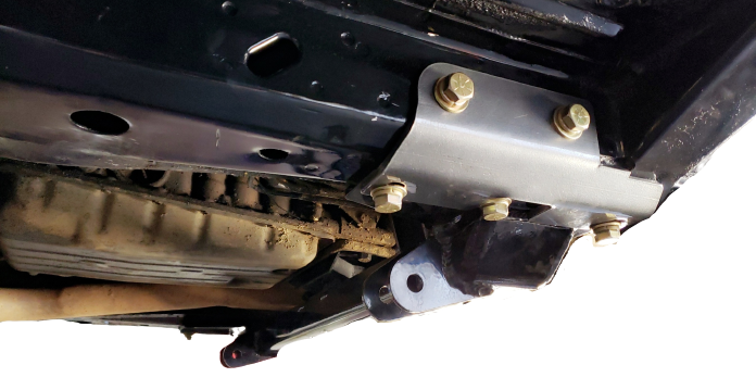 BKFabworks unibody frame tie-in bracket installed on Jeep Cherokee XJ, reinforcing 3-link suspension crossmember mount with Grade 8 hardware