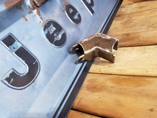 Side view of BKFabworks axle mount bracket for over-the-axle track bar setups. Weld-on bracket designed for Jeep and Dodge 4x4 front axles