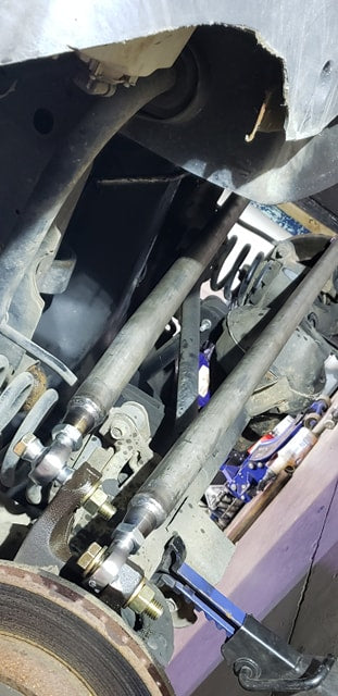 BKfabworks heavy-duty control arms installed on a Jeep Grand Cherokee WJ with upgraded heim joints BKFabworks HD Steering Kit for 1999–2004 Jeep Grand Cherokee


